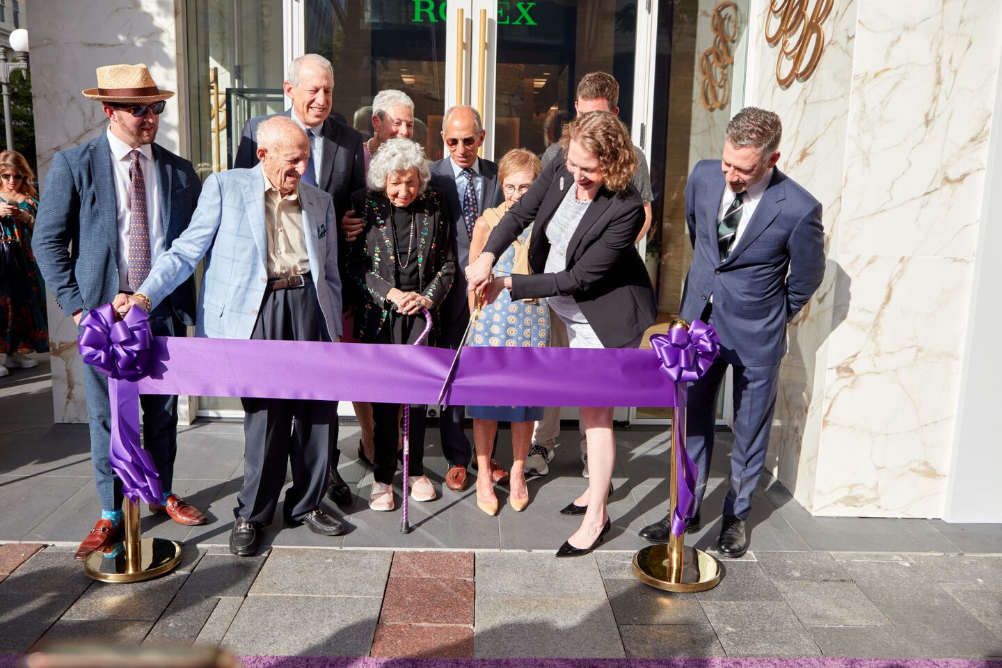 Generations of the Bridge family gather in front of the new Ben Bridge store for a ribbon cutting ceremony. 